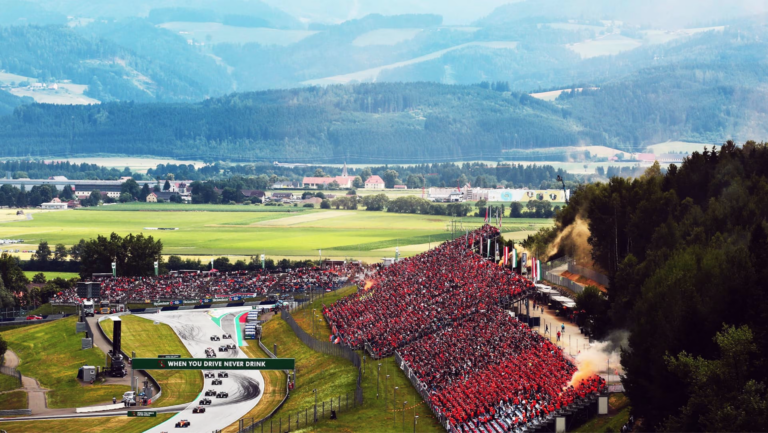 birdseye view of the austrian gp 2023 starting lap fans